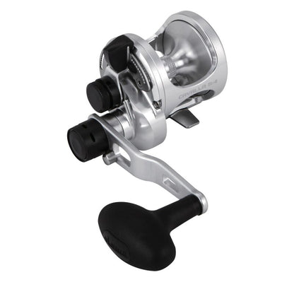 OKUMA Cavalla Two Speed 5II RH fishing reel with a sleek silver finish, ergonomic handle, and durable construction for saltwater fishing.